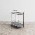 Carrello Portavivande In Acciaio Doppio Ripiano Cristallo Fumè Design Anni 70